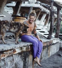 Why do people tend to travel to favelas, slums and other unfavorable places?