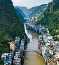 A city where houses stand almost in the river and cemeteries float in the air