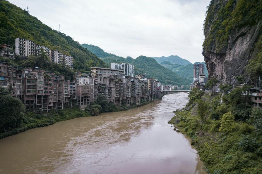 A city where houses stand almost in the river and cemeteries float in the air