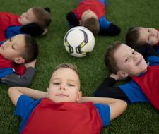 Arsenal FC Junior football summer camp Queen Ethelburgas College